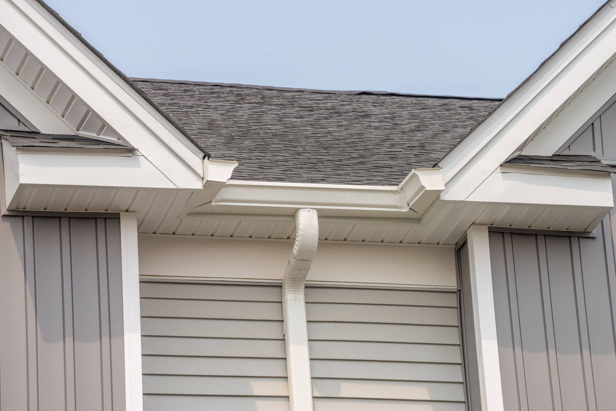 Gutter With Downpipe On The Roof Of A House Metal Pipe Gutter With Downpipe On The Roof Of A House Metal Pipe
